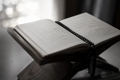 Open Notebook with Handwritten Scripture
