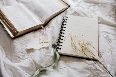 Morning Scripture Journal on White Quilt