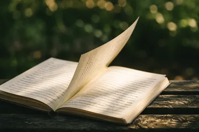 Open Scripture Notebook on Wooden Bench