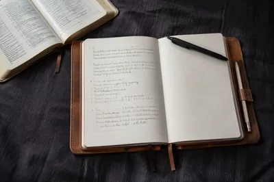 Open Journal with Handwritten Scripture Notes