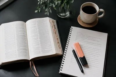 Open Bible and Notebook Flat Lay