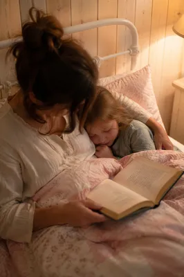 Parent Reading Bible at Child Bedtime