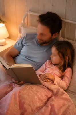 Parent Reading Bible at Child Bedtime