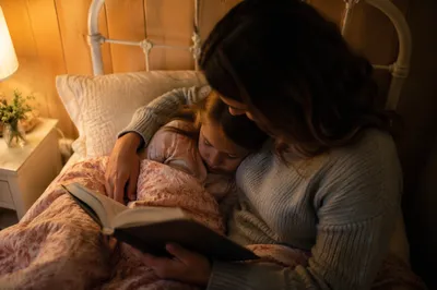 Parent Reading Bible at Bedtime