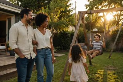 Parents Watching Children on Backyard Swing