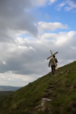 Carrying the Cross Up a Cloudy Hillside