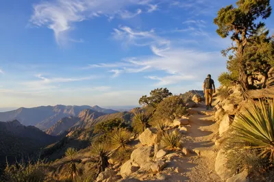 Lone Hiker on Desert Mountain Trail