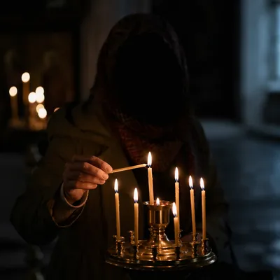 Candlelit Prayer in a Dark Chapel