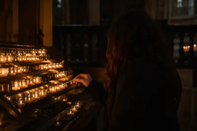 Quiet Candle Prayer in Dark Church