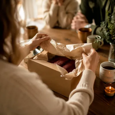 Joyful Gift Opening at Cozy Table