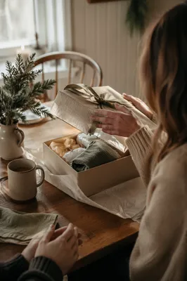 Joyful Gift Opening at Cozy Kitchen Table