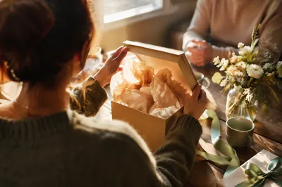 Joyful Gift Box Surprise at Cozy Table