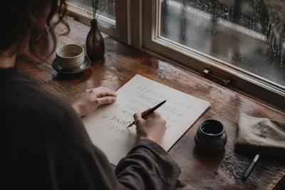 Calm Calligraphy Practice by Rainy Window