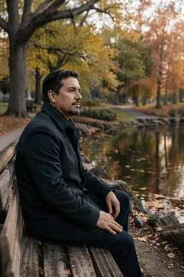 Man Sitting Alone on Park Bench
