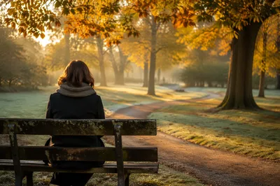 Solitary Prayer on Autumn Park Bench