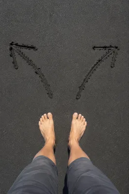 Barefoot Crossroads Decision on Dark Sand