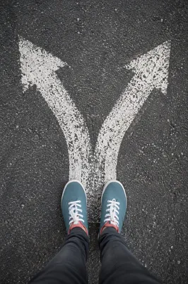 Person Facing a Crossroads Decision
