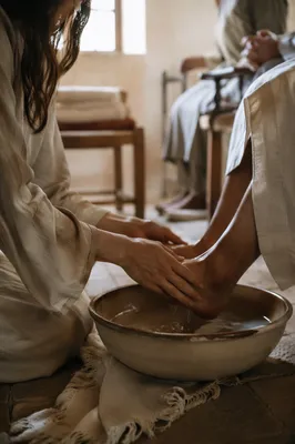 Humble Foot Washing Service in Morning Light