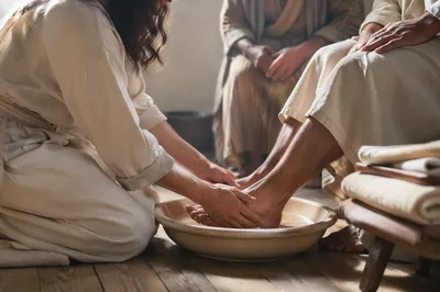 Humble Foot Washing Service in Morning Light