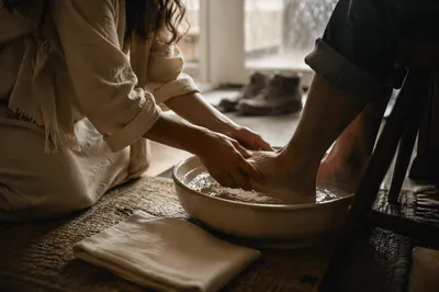 Humble Foot Washing in Quiet Entryway