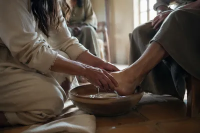 Humble Foot Washing in Morning Light