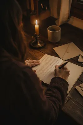 Candlelit Letter Writing at Wooden Desk