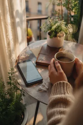 Morning Coffee with Phone and Earbuds