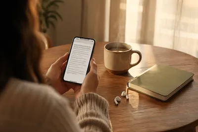 Morning Reading App with Earbuds and Mug