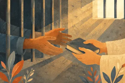 Hands Reaching Through Prison Bars