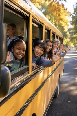 Children Waving from Yellow School Bus