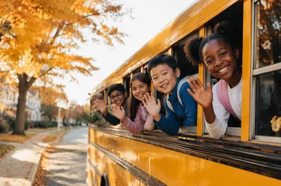 Children Waving from Yellow School Bus