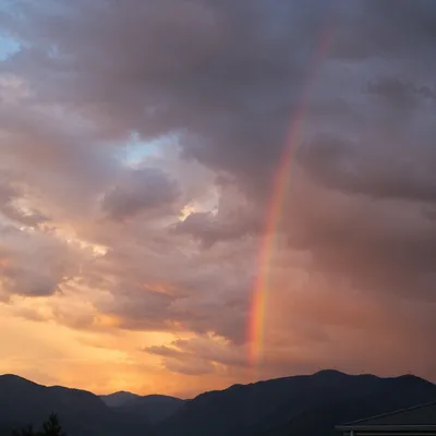 Peaceful Sunrise Rainbow After Storm