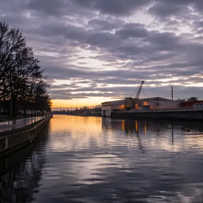 Peaceful Canal Sunrise After the Storm