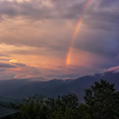 Peaceful Sunrise Rainbow After Storm
