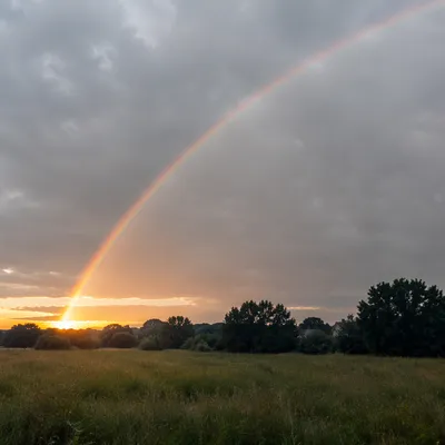 Peaceful Sunrise Rainbow After Storm