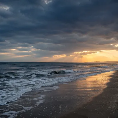 Peaceful Coastal Sunrise After Storm