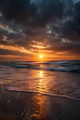 Peaceful Sunrise After Stormy Beach