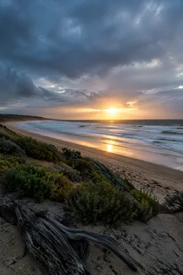 Peaceful Sunrise Over Storm Cleared Coast