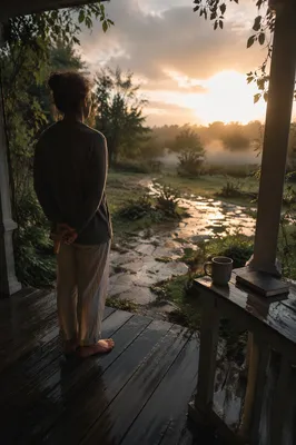 Peaceful Sunrise After Storm on Porch