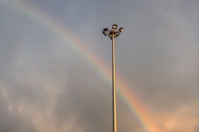 Peaceful Sunrise Rainbow After Storm