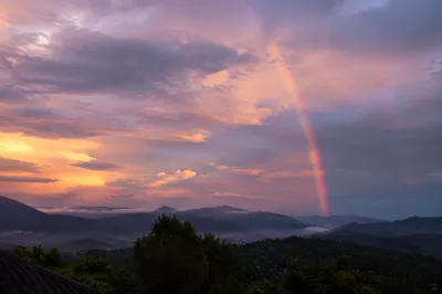 Peaceful Sunrise Rainbow After Storm