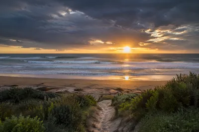Peaceful Coastal Sunrise After the Storm