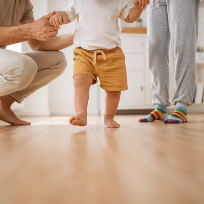 Toddler First Steps with Parents at Home