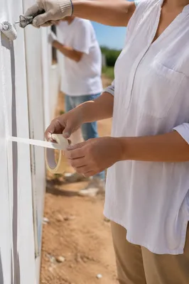 Church Volunteers Painting Community Wall