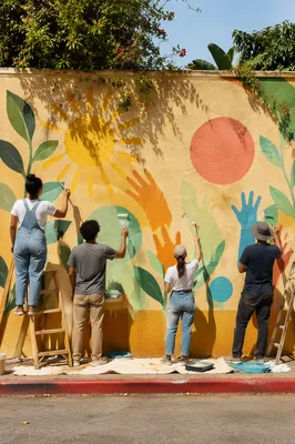 Volunteers Painting a Joyful Community Mural