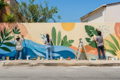 Community Volunteers Painting a Neighborhood Mural