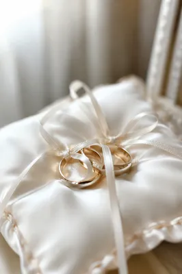 Gold Wedding Rings on Satin Pillow