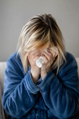 Woman Wiping Tears in Quiet Comfort