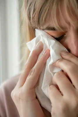 Woman Wiping Tears in Quiet Comfort