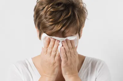 Woman Wiping Tears in Quiet Comfort